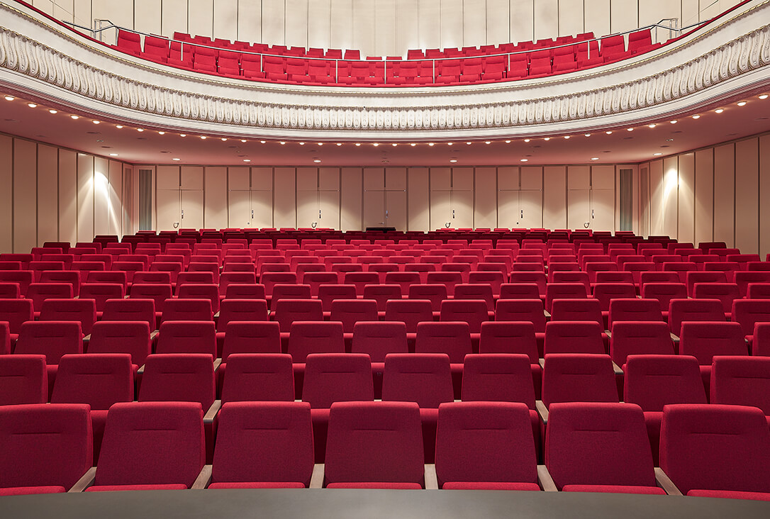 Exquisitely hand-crafted custom armchairs for jewel-box theatre in spa town Bad Oeynhausen (Germany)